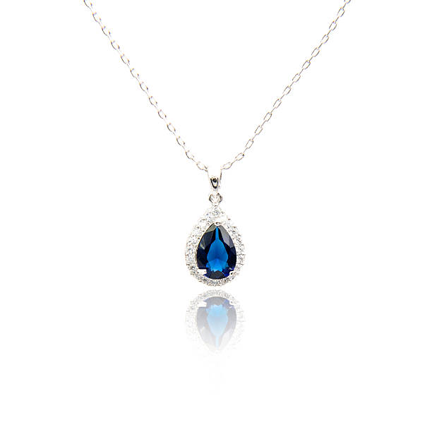 istock Sapphire pendant isolated on white 615801560
