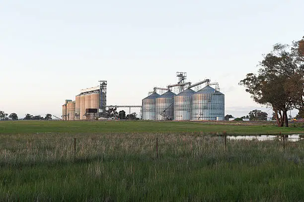 Distant view of Grain silos on the railway line  rural  New South Wales, Australia