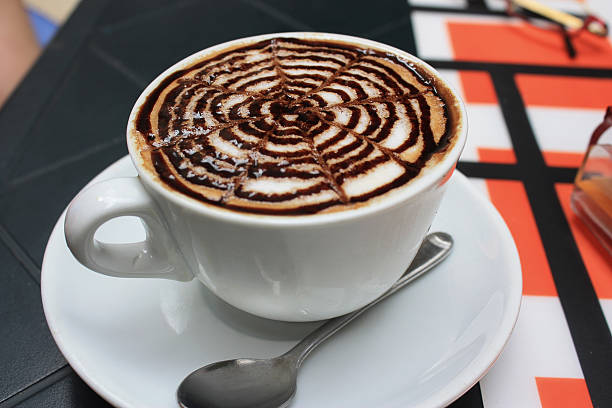 istock Cup of cappuccino beautifully decorated. 615802654