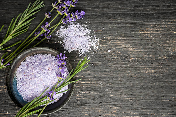 Body care Bath salts herbal body care product with fresh lavender on rustic wooden background, copy space bath salt photos stock pictures, royalty-free photos & images