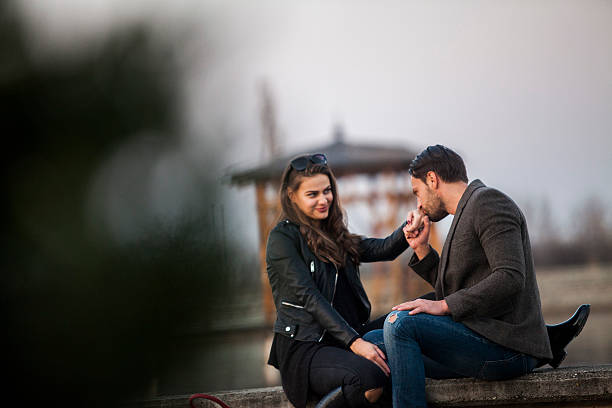 istock Cheerful couple in the park 615802804