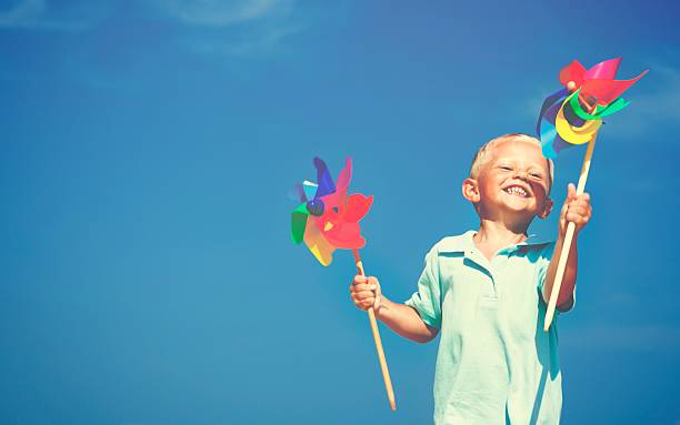 istock Turbine Paper Beach Carefree Playing Wind Concept 615812680