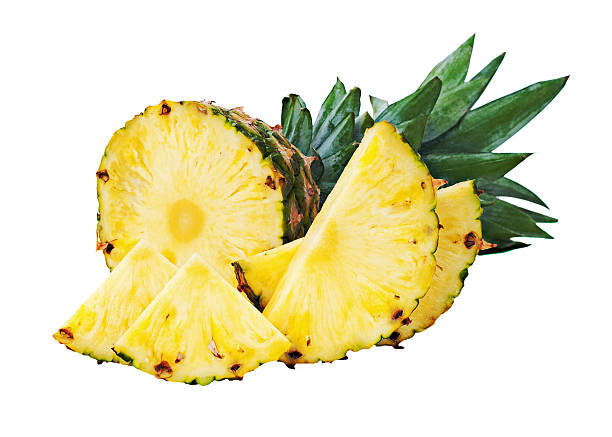istock Ripe whole pineapple with slices isolated on white background. 615813648