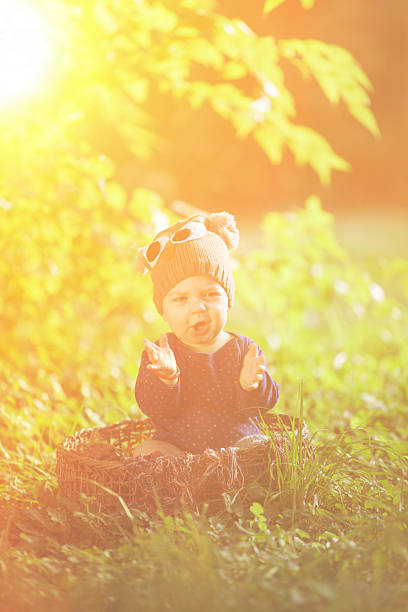 istock baby boy in park 615813652