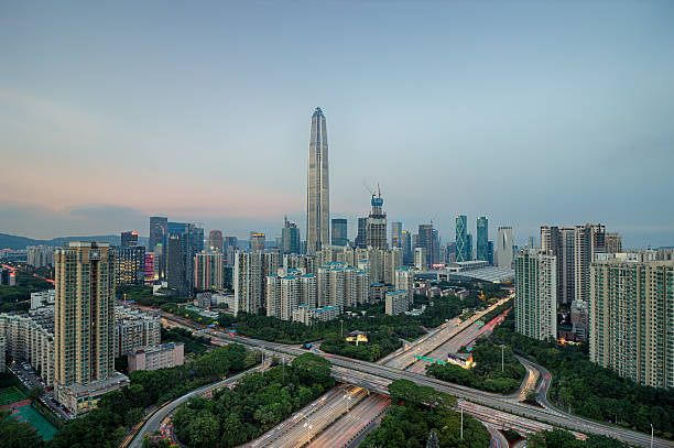 istock Skyline of Shenzhen CBD day to night 615814660