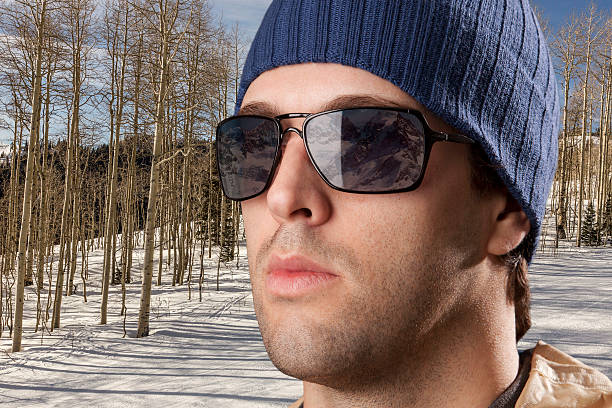 istock skier looking for a snowy mountain. 615815056