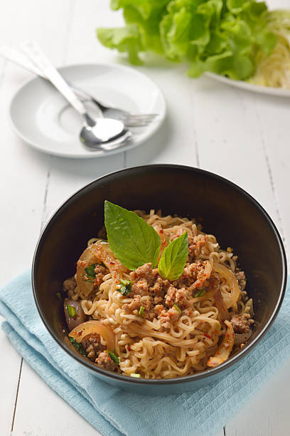 istock Instant noodle with spicy minced pork salad, minced pork mash 615815086