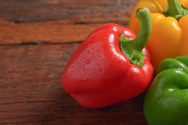 istock Red Green and Yellow sweet pepper 615818014