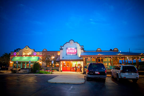 New Orleans, LA, USA - Apr 7, 2025: Exterior view of a McDonald's restaurant featuring golden arch-shaped structure with rounded, decorative arches, in New Orleans, Louisiana.