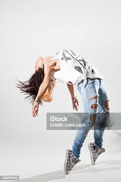 Dancer Posing On A Studio Background Stock Photo - Download Image Now - One Woman Only, Women, Dancer