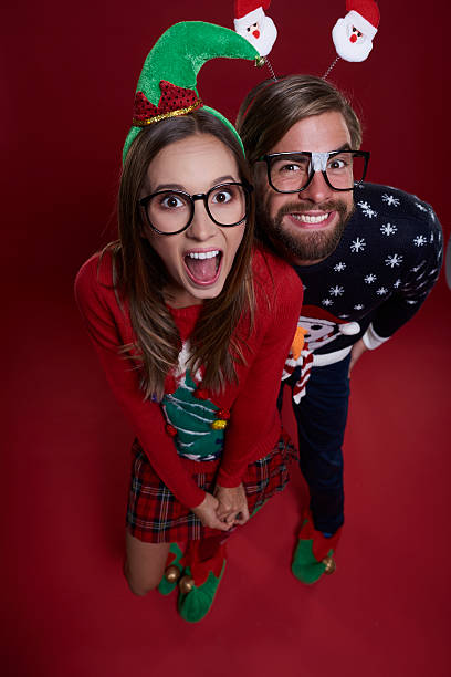 istock High angle view on couple of nerds 615820468
