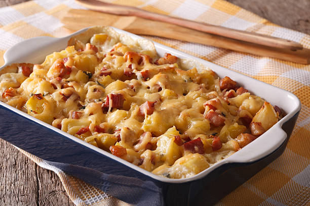 istock Tasty potatoes with bacon and cheese close up. horizontal 615820616