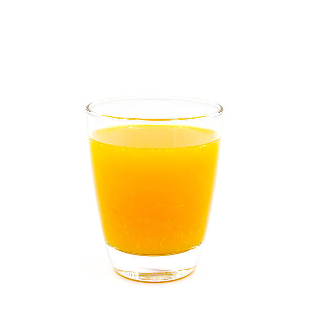 istock Fresh orange juice isolated on white background 615821178