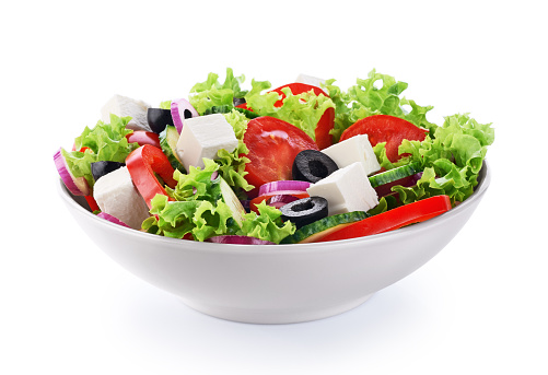 Salad with cheese and fresh vegetables isolated on white backgro