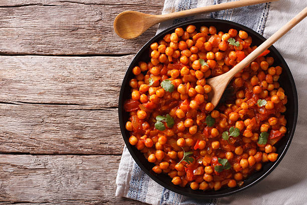 istock Indian Food Chana masala on a table. Horizontal top view 615822220
