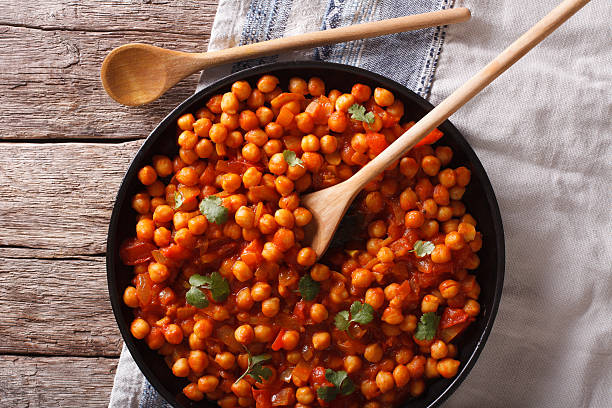 istock Indian Food Chana masala on table close-up. Horizontal top view 615823008