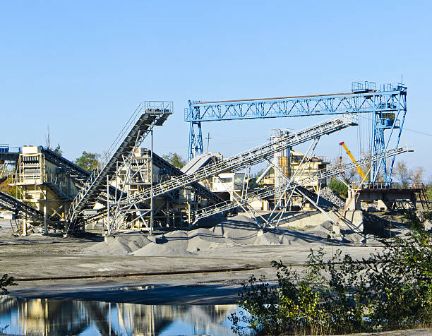 istock Conveyor and mining equipment in a granite quarry 615825002
