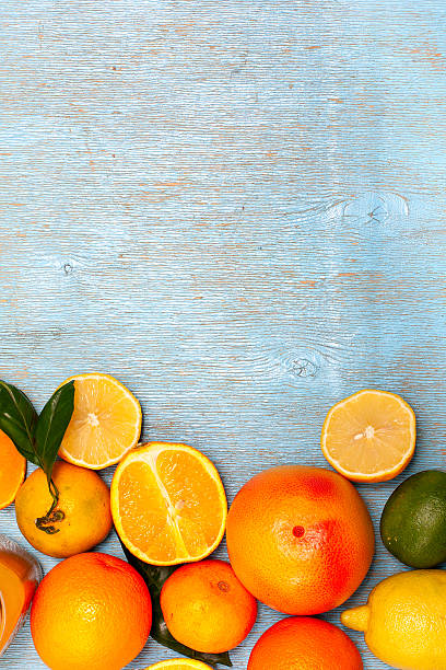 istock Citrus fruits - orange, lemon, lime, mandarin, grapefruit, top view 615825038