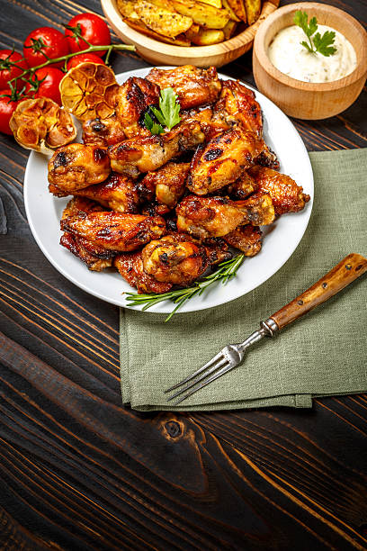istock roasted chicken wings with herbs 615825592