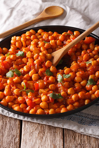 istock chickpeas in curry sauce on plate close-up on the table 615826686