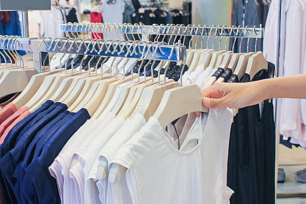 istock Women selecting clothes in the store 615828186