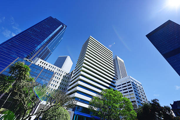 Low angle view of skyscrapers into the sky