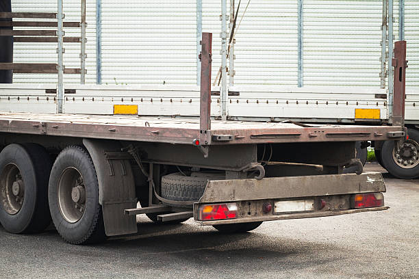 istock Rear fragment empty truck cargo trailer 615831012