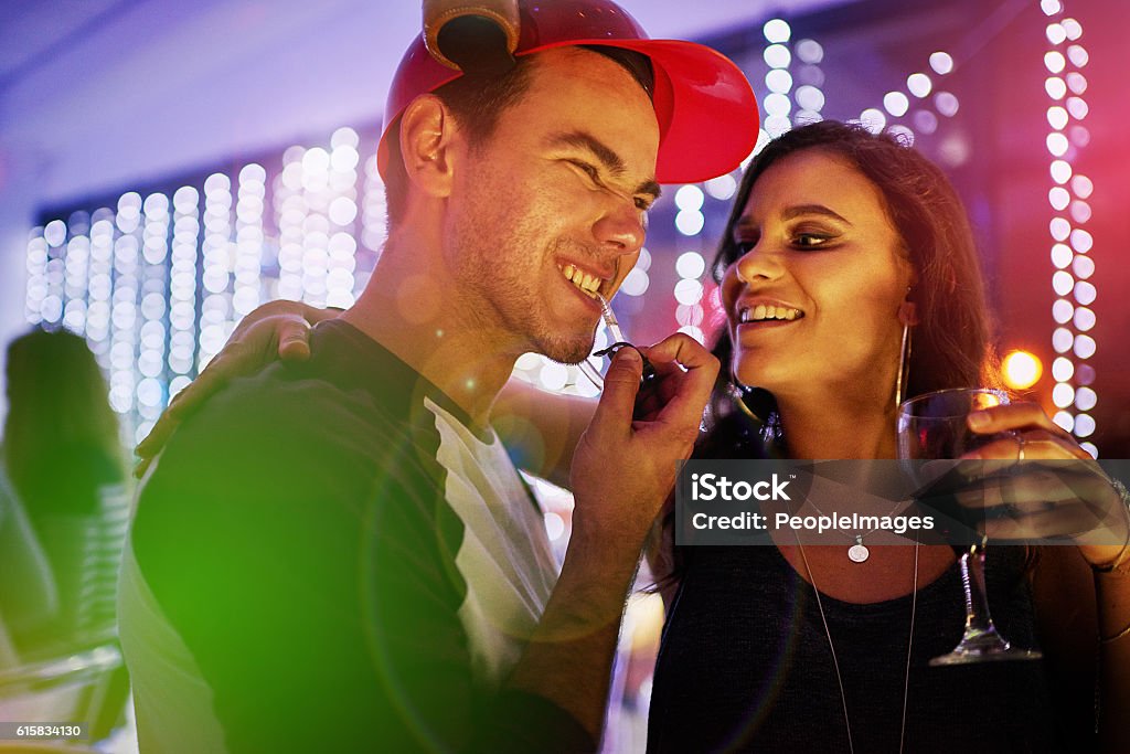 Friday? More like Fri-YAY Shot of a young couple enjoying themselves at a nightclub 20-29 Years Stock Photo