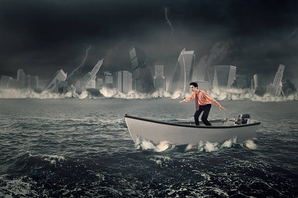 istock Businessman balancing on the boat 615836506