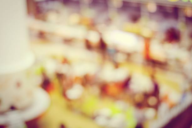 istock Abstract blurred image of people set up booth for Exhibition 615837474