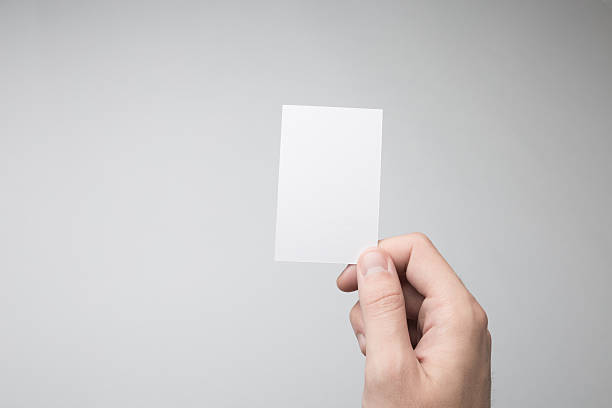 istock Hand holding Blank Business Cards Mock-up. 615837950