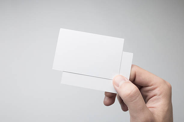istock Hand holding Blank Business Cards Mock-up. 615837984