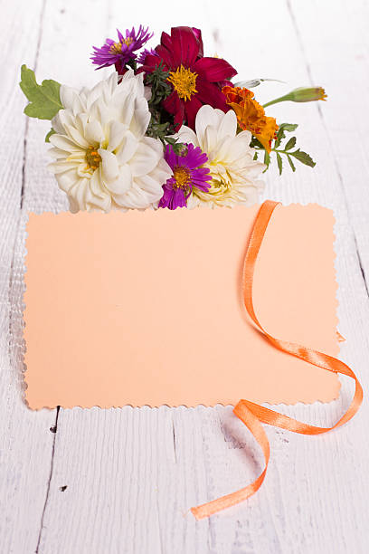 istock autumn flowers and card for your text 615839428