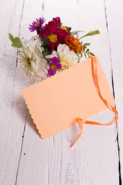 istock autumn flowers and card for your text 615839702