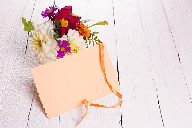 istock autumn flowers and card for your text 615839790