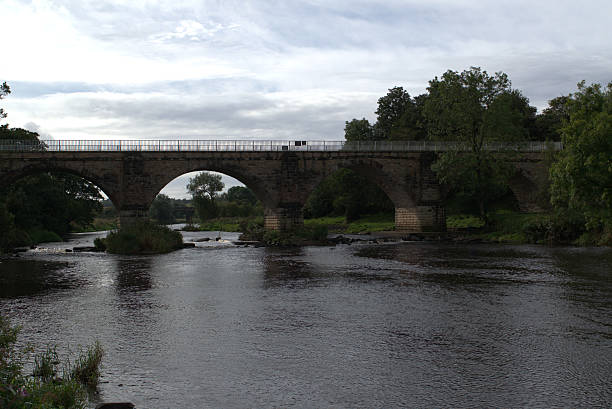 istock Four arches of Laigh Milton Viaduct, downstream 615839826