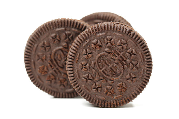 istock Chocolate cookies with cream filling 615840968