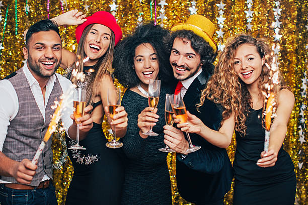 istock Champagne toast and sparklers 615882156