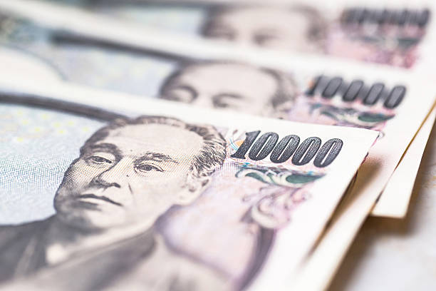 istock Japanese yen banknotes 615883262