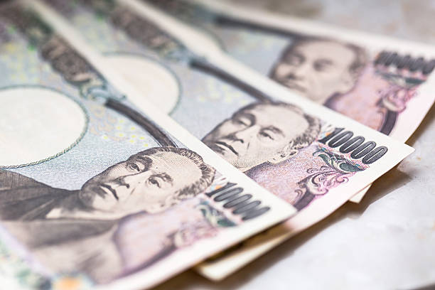 istock Japanese yen banknotes 615883322