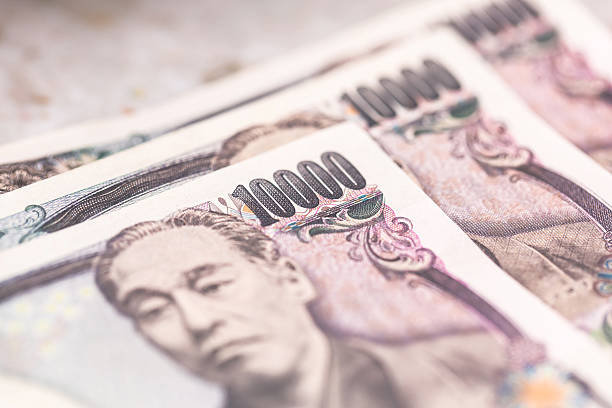 istock Japanese yen banknotes 615883746