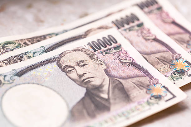 istock Japanese yen banknotes 615883798