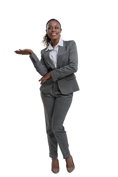 istock Business woman presenting 615884636