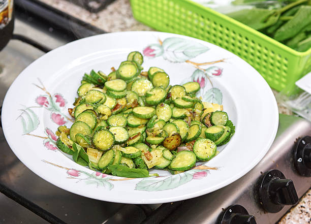 istock sliced courgette in a fryning pan 615886398