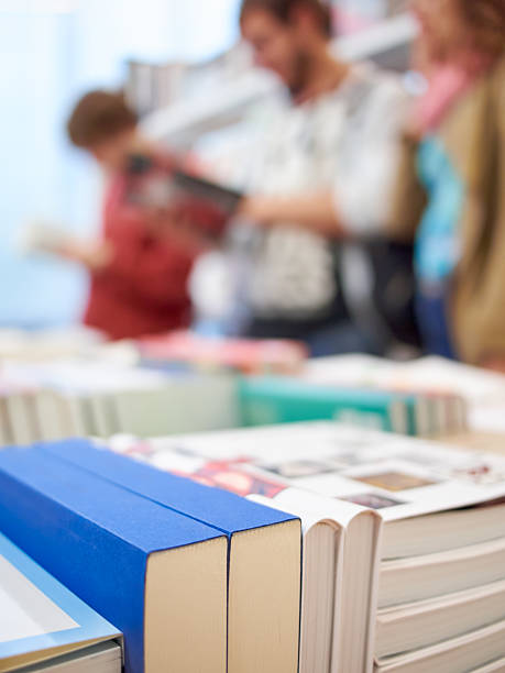 istock Books and people in the store 615886630