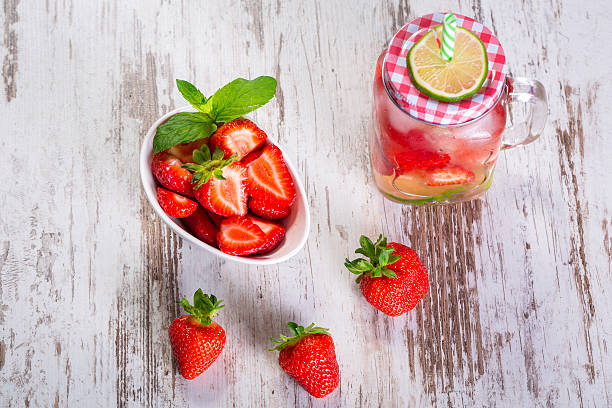istock Summer strawberry lemonade in a jar glass 615887846