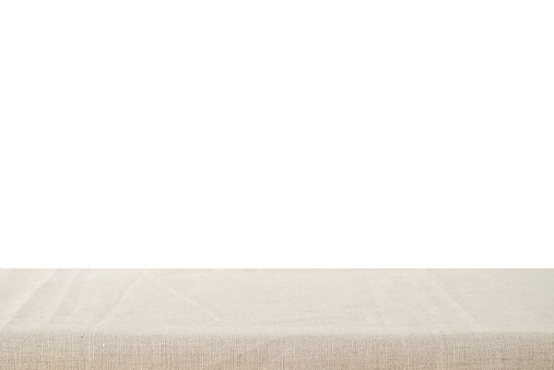 Mantel de lino vacío aislado sobre fondo blanco photo