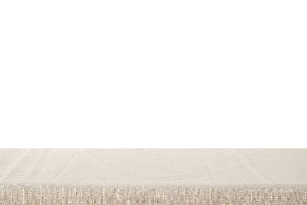 Empty linen tablecloth isolated on white background Empty linen tablecloth isolated on white background, product display montage tablecloth photos stock pictures, royalty-free photos & images