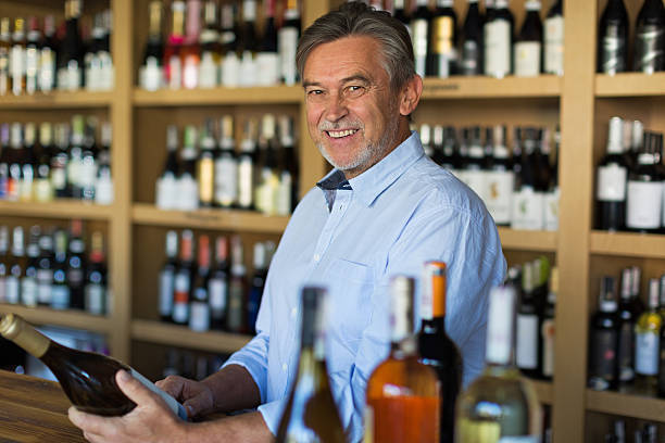 istock Wine Shop Owner 615890360
