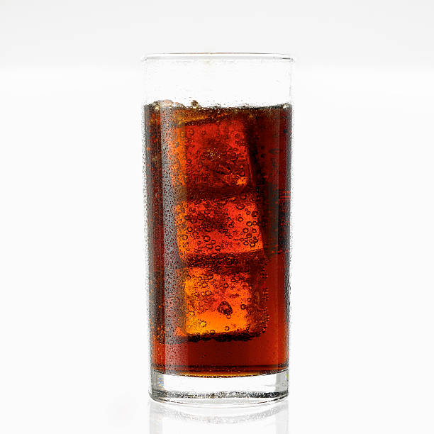 istock glass of cola with ice 615893802
